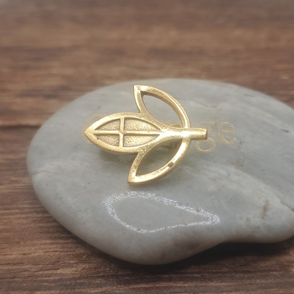 B426 religious lotus cross pin antique
